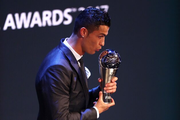 LONDON, ENGLAND - OCTOBER 23:  Cristiano Ronaldo of Portugal and Real Madrid CF wins The best Fifa men's player during The Best FIFA Football Awards Show on October 23, 2017 in London, England.   (Photo by Michael Steele/Getty Images)
