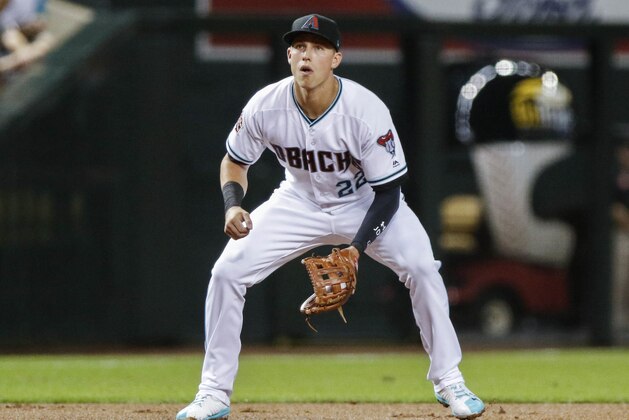 Arizona Diamondback' Jake Lamb plays third base against the Colorado Rockies during a baseball game Friday, July 20, 2018, in Phoenix. (AP Photo/Darryl Webb)