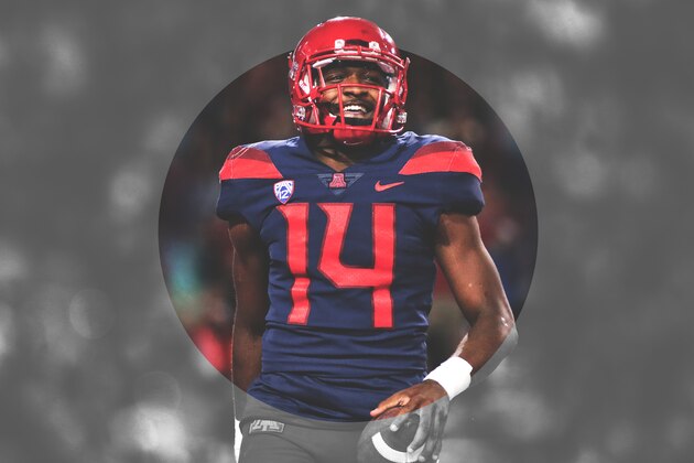 TUCSON, AZ - NOVEMBER 11:  Quarterback Khalil Tate #14 of the Arizona Wildcats watches from the bench during the second half of the college football game against the Oregon State Beavers at Arizona Stadium on November 11, 2017 in Tucson, Arizona.  (Photo by Christian Petersen/Getty Images)