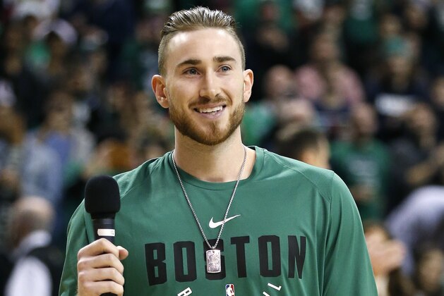 Boston Celtics Gordon Hayward addresses the crowd before an NBA basketball game against the Washington Wizards in Boston, Monday, Dec. 25, 2017. (AP Photo/Michael Dwyer)