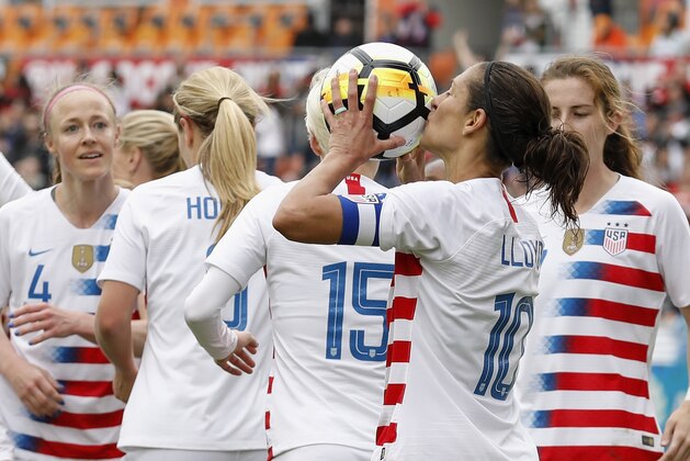 HOUSTON, TX - APRIL 08:  Carli Lloyd #10 of United States kisses the ball after a goal in the first half against the Mexico at BBVA Compass Stadium on April 8, 2018 in Houston, Texas.  (Photo by Tim Warner/Getty Images)
