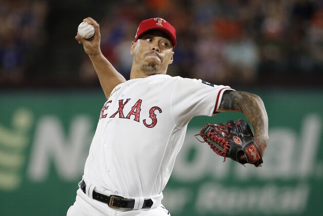 Texas Rangers relief pitcher Keone Kela (50) throws during the ninth inning of a baseball game against the Houston Astros, Wednesday, July 4, 2018, in Arlington, Texas. Houston won 5-4 in 10 innings. (AP Photo/Brandon Wade)