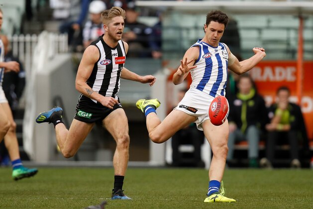MELBOURNE, AUSTRALIA - JULY 21: Luke Davies-Uniacke of the Kangaroos kicks the ball during the 2018 AFL round 18 match between the Collingwood Magpies and the North Melbourne Kangaroos at the Melbourne Cricket Ground on July 21, 2018 in Melbourne, Australia. (Photo by Michael Willson/AFL Media/Getty Images)