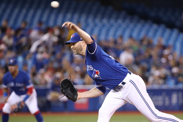 TORONTO, ON - JULY 22: J.A. Happ #33 of the Toronto Blue Jays delivers a pitch in the first inning during MLB game action against the Baltimore Orioles at Rogers Centre on July 22, 2018 in Toronto, Canada. (Photo by Tom Szczerbowski/Getty Images)