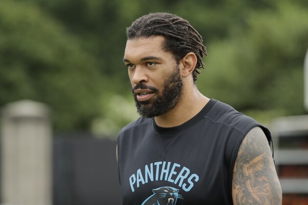 Carolina Panthers' Julius Peppers arrives before the NFL football team's practice in Charlotte, N.C., Tuesday, June 12, 2018. (AP Photo/Chuck Burton)