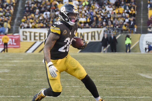 Pittsburgh Steelers running back Le'Veon Bell (26) heads for the end zone after taking a pass from quarterback Ben Roethlisberger during the second half of an NFL divisional football AFC playoff game against the Jacksonville Jaguars in Pittsburgh, Sunday, Jan. 14, 2018. (AP Photo/Don Wright)