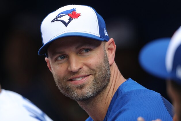 TORONTO, ON - JULY 20: J.A. Happ #33 of the Toronto Blue Jays smiles as he is recognized for being selected to the All-Star Game during MLB game action against the Baltimore Orioles at Rogers Centre on July 20, 2018 in Toronto, Canada. (Photo by Tom Szczerbowski/Getty Images)