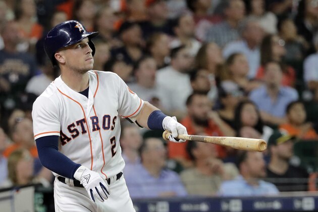 Houston Astros' Alex Bregman watches his home run against the Oakland Athletics during the first inning of a baseball game Tuesday, July 10, 2018, in Houston. (AP Photo/David J. Phillip)