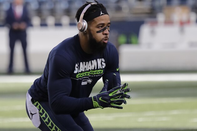 Seattle Seahawks free safety Earl Thomas warms up before an NFL football game against the Arizona Cardinals, Sunday, Dec. 31, 2017, in Seattle. (AP Photo/Elaine Thompson)