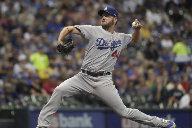 Los Angeles Dodgers starting pitcher Rich Hill throws during the first inning of a baseball game against the Milwaukee Brewers Friday, July 20, 2018, in Milwaukee. (AP Photo/Morry Gash)