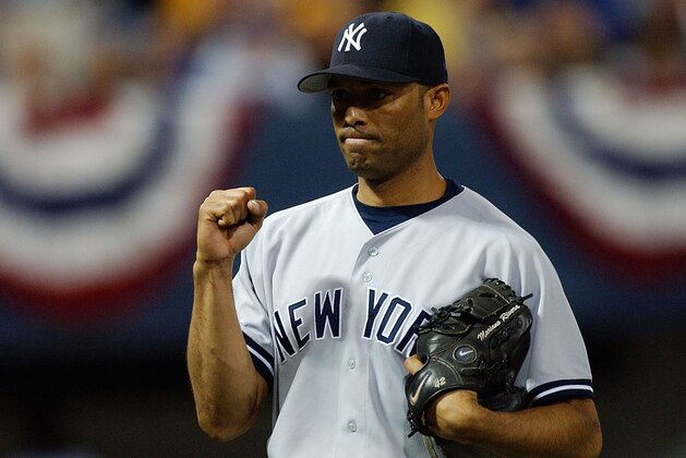 MINNEAPOLIS - OCTOBER 9:  Mariano Rivera #42 of the New York Yankees pumps his fist after defeating the the Minnesota Twins in game four of the American League Divisional Series at the Hubert H. Humphrey Metrodome on October 9, 2004 in Minneapolis, Minnesota.The Yankees defeated the Twins 6-5 to advance to the American League Championship Series against the Boston Red Sox. (Photo by Jonathan Daniel/Getty Images)