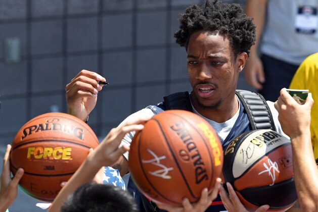 LAS VEGAS, NV - JULY 26:  DeMar DeRozan #35 of the United States signs autographs for fans after a practice session at the 2018 USA Basketball Men's National Team minicamp at the Mendenhall Center at UNLV on July 26, 2018 in Las Vegas, Nevada.  (Photo by Ethan Miller/Getty Images)