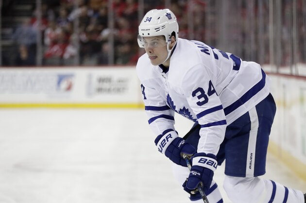 Toronto Maple Leafs center Auston Matthews skates with the puck against the New Jersey Devils during the first period of an NHL hockey game, Thursday, April 5, 2018, in Newark, N.J. (AP Photo/Julio Cortez)