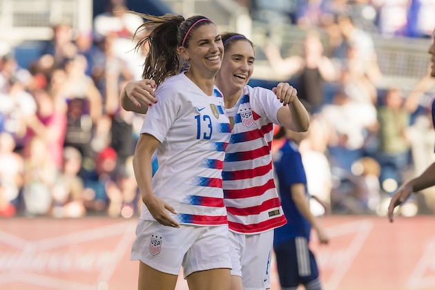 KANSAS CITY, KS - JULY 26: Alex Morgan #13 celebrates with Lindsey Horan #9 of USA after scoring the first goal against Japan during the first half of the 2018 Tournament Of Nations on July 26, 2018 at Children's Mercy Park in Kansas City, Kansas. (Photo by Kyle Rivas/Getty Images)