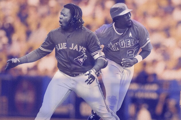 Toronto Blue Jays prospect Vladimir Guerrero Jr., left, looks at right fielder Teoscar Hernandez's bat as they talk before a baseball game against the Tampa Bay Rays Monday, June 11, 2018, in St. Petersburg, Fla. The Toronto Blue Jays say prospect Guerrero Jr. will miss at least four weeks because of a strained patellar tendon in his left knee. (AP Photo/Chris O'Meara)