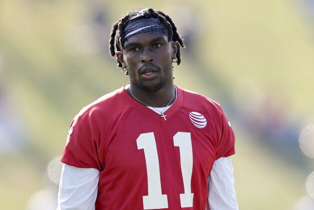 Atlanta Falcons wide receiver Julio Jones walks on the field during an NFL football training camp practice in Flowery Branch, Ga., Friday, July 27, 2018. (AP Photo/David Goldman)