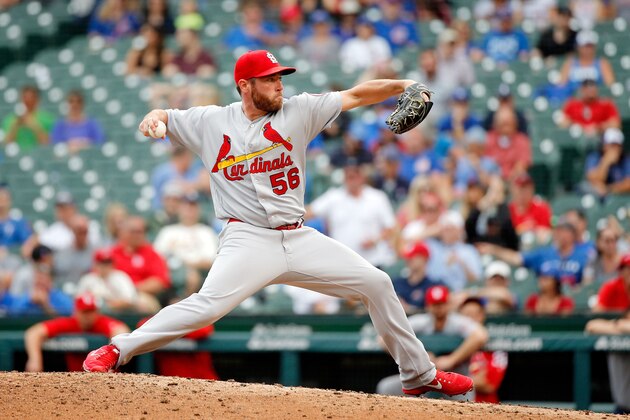 CHICAGO, IL - JULY 20: Greg Holland #56 of the St. Louis Cardinals pitches against the Chicago Cubs during the ninth inning at Wrigley Field on July 20, 2018 in Chicago, Illinois. The St. Louis Cardinals won 18-5. (Photo by Jon Durr/Getty Images)