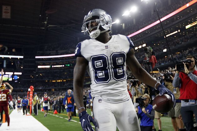 Dallas Cowboys wide receiver Dez Bryant (88) smiles after catching a touchdown pass in the second half of an NFL football game against the Washington Redskins on Thursday, Nov. 30, 2017, in Arlington, Texas. (AP Photo/Ron Jenkins)