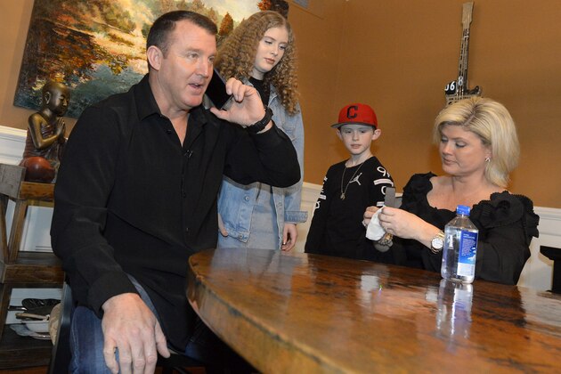 CHICAGO - JANUARY 24:  Former Major League player Jim Thome receives a phone call from the National Baseball Hall of Fame in Cooperstown, New York, informing him that he has been elected to the Hall of Fame. Jim accepted the call while surrounded by his family, wife Andrea and children Lila Grace and Landon. (Photo by Ron Vesely/MLB Photos via Getty Images)