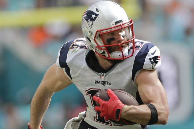 New England Patriots wide receiver Julian Edelman (11) runs the ball, during the first half of an NFL football game against the Miami Dolphins, Sunday, Jan. 1, 2017, in Miami Gardens, Fla. (AP Photo/Alan Diaz)