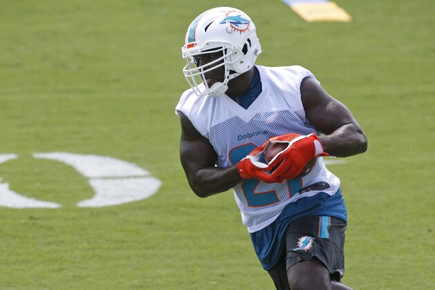 Miami Dolphins running back Frank Gore runs through drills during practice at the NFL football team's training camp, Tuesday, June 5, 2018, at the Dolphins training facility in Davie, Fla. (AP Photo/Wilfredo Lee) Miami Dolphins running back Frank Gore runs through drills during practice at the NFL football team's training camp, Tuesday, June 5, 2018, at the Dolphins training facility in Davie, Fla. (AP Photo/Wilfredo Lee)