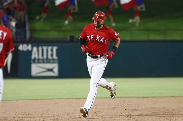 Texas Rangers' Joey Gallo circles the bases on his solo home run against the Cleveland Indians during the ninth inning of a baseball game, Friday, July 20, 2018, in Arlington, Texas. The Cleveland Indians won 9-8. (AP Photo/Jim Cowsert)