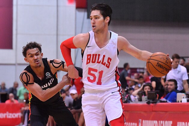 LAS VEGAS, NV - JULY 10:  Ryan Arcidiacono #51 of the Chicago Bulls drives against Trae Young #11 of the Atlanta Hawks during the 2018 NBA Summer League at the Cox Pavilion on July 10, 2018 in Las Vegas, Nevada. NOTE TO USER: User expressly acknowledges and agrees that, by downloading and or using this photograph, User is consenting to the terms and conditions of the Getty Images License Agreement.  (Photo by Sam Wasson/Getty Images)