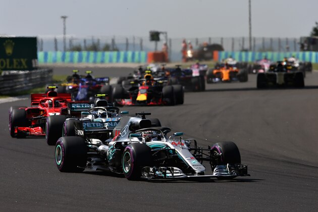 BUDAPEST, HUNGARY - JULY 29: Lewis Hamilton of Great Britain driving the (44) Mercedes AMG Petronas F1 Team Mercedes WO9 leads Valtteri Bottas driving the (77) Mercedes AMG Petronas F1 Team Mercedes WO9 on track during the Formula One Grand Prix of Hungary at Hungaroring on July 29, 2018 in Budapest, Hungary.  (Photo by Charles Coates/Getty Images)