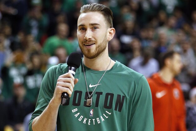 Boston Celtics Gordon Hayward addresses the crowd before an NBA basketball game against the Washington Wizards in Boston, Monday, Dec. 25, 2017. (AP Photo/Michael Dwyer)