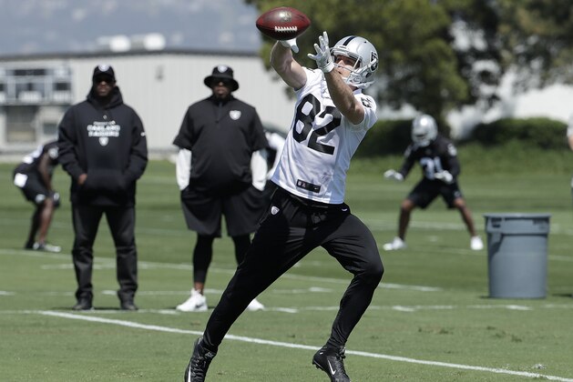 Oakland Raiders wide receiver Jordy Nelson catches a pass at the team's football facility in Alameda, Calif., Tuesday, April 24, 2018. (AP Photo/Jeff Chiu)
