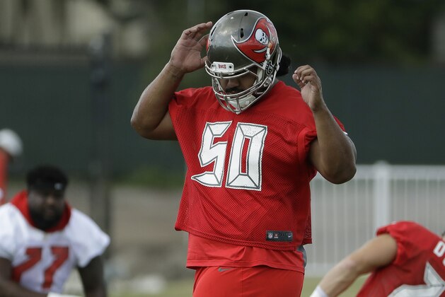 Tampa Bay Buccaneers defensive tackle Vita Vea (50) stretches during an NFL football minicamp Thursday, June 14, 2018, in Tampa, Fla. (AP Photo/Chris O'Meara)