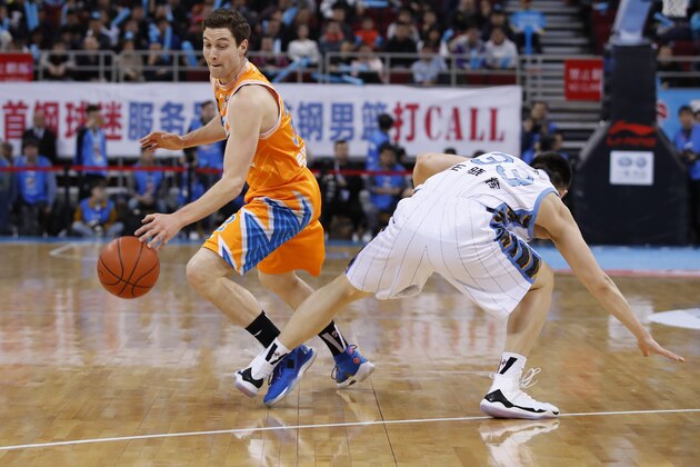 BEIJING,  CHINA - MARCH 04:  Jimmer Fredette #32 of Shanghai Bilibili in action during the 2017/2018 CBA League match between Beijing Ducks and Shanghai Bilibili at Cadillac Arena on March 4,  2018 in Beijing,  China.  (Photo by XIN LI/Getty Images)