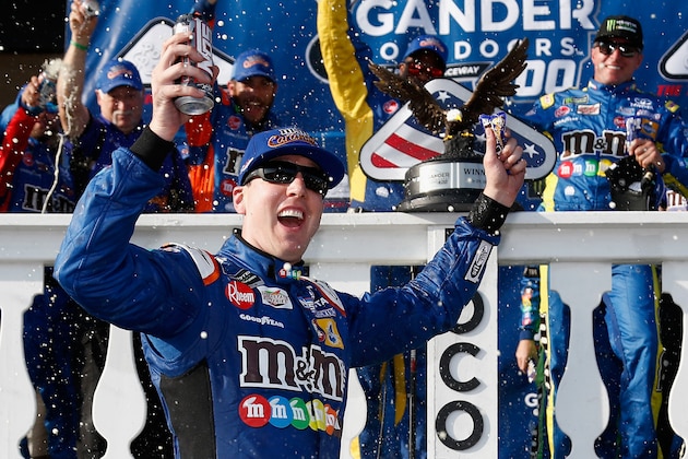 LONG POND, PA - JULY 29: Kyle Busch, driver of the #18 M&M's Caramel Toyota, celebrates in Victory Lane after winning the Monster Energy NASCAR Cup Series Gander Outdoors 400 at Pocono Raceway on July 29, 2018 in Long Pond, Pennsylvania. (Photo by Jeff Zelevansky/Getty Images) LONG POND, PA - JULY 29: Kyle Busch, driver of the #18 M&M's Caramel Toyota, celebrates in Victory Lane after winning the Monster Energy NASCAR Cup Series Gander Outdoors 400 at Pocono Raceway on July 29, 2018 in Long Pond, Pennsylvania. (Photo by Jeff Zelevansky/Getty Images)