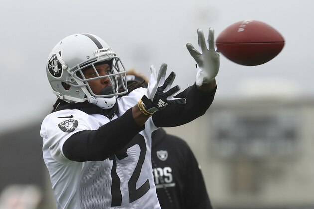 Oakland Raiders' Martavis Bryant catches a pass during NFL football practice on Tuesday, May 22, 2018, at the team's training facility in Alameda, Calif. (AP Photo/Ben Margot)