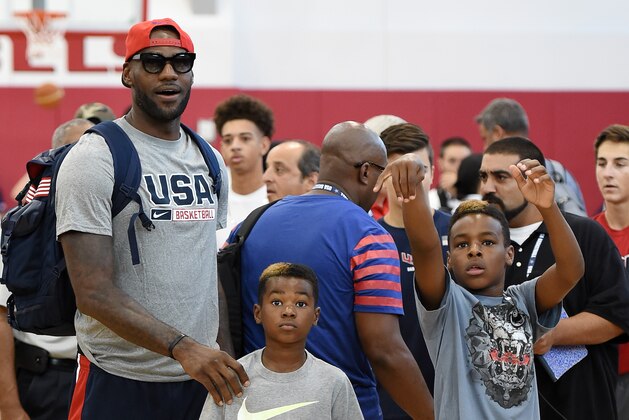 LAS VEGAS, NV - AUGUST 12:  (L-R) LeBron James #27 of the 2015 USA Basketball Men's National Team and his sons Bryce James and LeBron James Jr. attend a practice session at the Mendenhall Center on August 12, 2015 in Las Vegas, Nevada.  (Photo by Ethan Miller/Getty Images)