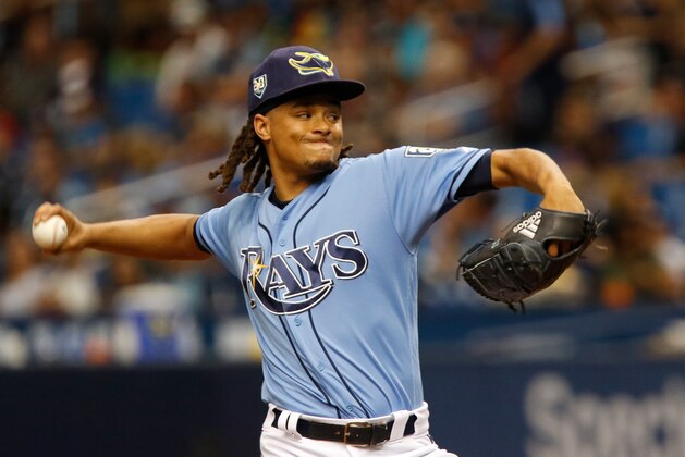 ST. PETERSBURG, FL  JULY 22: Chris Archer #22 of the Tampa Bay Rays delivers a pitch during the first inning against the Miami Marlins at Tropicana Field on July 22, 2017 in St. Petersburg, Florida. (Photo by Joseph Garnett Jr./Getty Images)