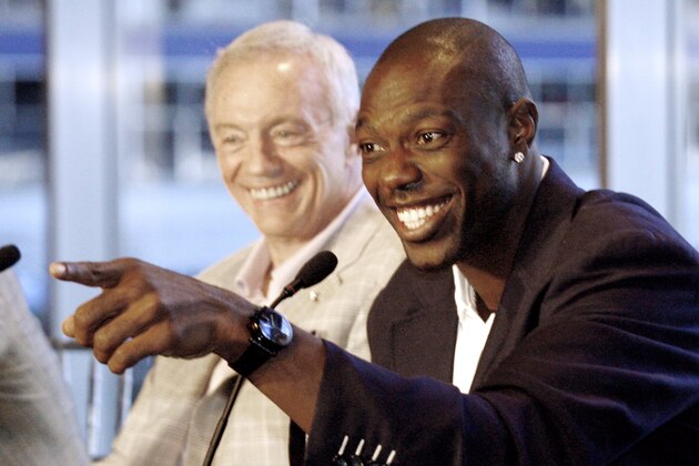 Dallas Cowboy's owner Jerry Jones, left, laughs as wide receiver Terrell Owens answers a question at the news conference announcing his signing of a new three year, $27 million contract extension, Tuesday, June 3, 2008, in Irving, Texas. The extension brings the overall length and value of the contract to four years and $34 million. (AP Photo/Mike Stone)