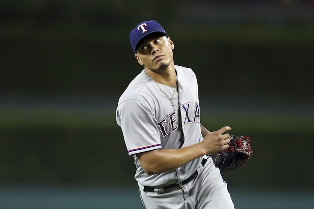 Texas Rangers relief pitcher Keone Kela runs to greet catcher Isiah Kiner-Falefa after the final out of a baseball game against the Detroit Tigers, Thursday, July 5, 2018, in Detroit. (AP Photo/Carlos Osorio)