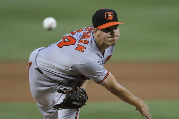 Baltimore Orioles starting pitcher Kevin Gausman throws during the fourth inning of the team's baseball game against the Washington Nationals at Nationals Park, Thursday, June 21, 2018, in Washington. (AP Photo/Carolyn Kaster)