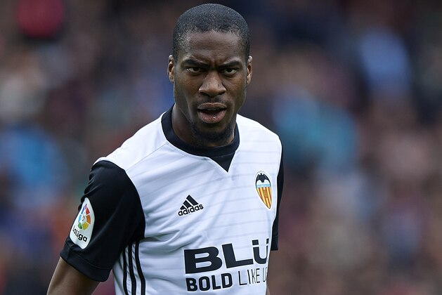 BARCELONA, SPAIN - APRIL 14:  Geoffrey Kondogbia of Valencia reacts during the La Liga match between Barcelona and Valencia at Camp Nou on April 14, 2018 in Barcelona, Spain.  (Photo by Quality Sport Images/Getty Images)