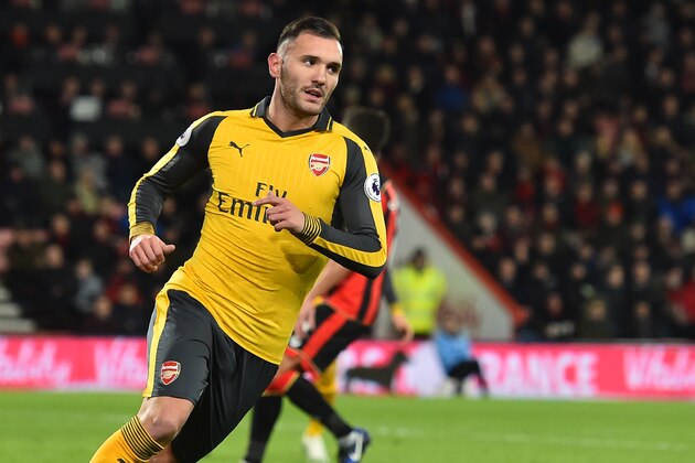 Arsenal's Spanish striker Lucas Perez celebrates after scoring their second goal during the English Premier League football match between Bournemouth and Arsenal at the Vitality Stadium in Bournemouth, southern England on January 3, 2017. / AFP / Glyn KIRK / RESTRICTED TO EDITORIAL USE. No use with unauthorized audio, video, data, fixture lists, club/league logos or 'live' services. Online in-match use limited to 75 images, no video emulation. No use in betting, games or single club/league/player publications.  /         (Photo credit should read GLYN KIRK/AFP/Getty Images)