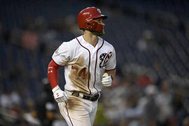 Washington Nationals' Bryce Harper watches his home run during a baseball game against the Atlanta Braves, Sunday, July 22, 2018, in Washington. The Nationals won 6-2.(AP Photo/Nick Wass)