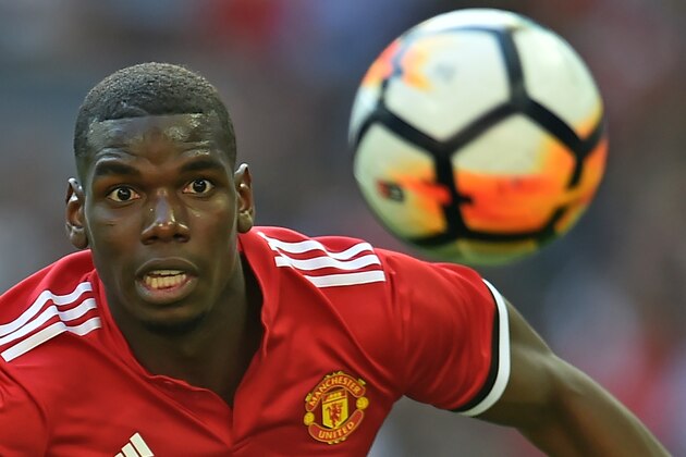 Manchester United's French midfielder Paul Pogba chases the ball during the English FA Cup final football match between Chelsea and Manchester United at Wembley stadium in London on May 19, 2018. (Photo by Glyn KIRK / AFP) / NOT FOR MARKETING OR ADVERTISING USE / RESTRICTED TO EDITORIAL USE        (Photo credit should read GLYN KIRK/AFP/Getty Images)