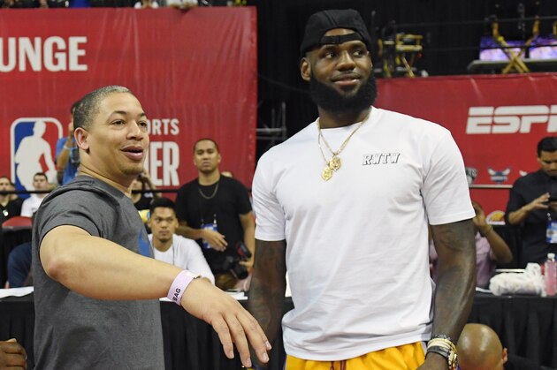 LAS VEGAS, NV - JULY 15:  Head coach Tyronn Lue (L) of the Cleveland Cavaliers talks with LeBron James of the Los Angeles Lakers after a quarterfinal game of the 2018 NBA Summer League between the Lakers and the Detroit Pistons at the Thomas & Mack Center on July 15, 2018 in Las Vegas, Nevada. NOTE TO USER: User expressly acknowledges and agrees that, by downloading and or using this photograph, User is consenting to the terms and conditions of the Getty Images License Agreement.  (Photo by Ethan Miller/Getty Images)