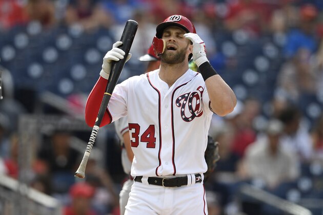 Washington Nationals' Bryce Harper reacts after he struck out in the third inning of a baseball game against the Atlanta Braves, Sunday, July 22, 2018, in Washington. (AP Photo/Nick Wass)