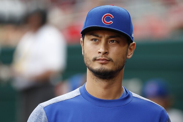 Chicago Cubs starting pitcher Yu Darvish walks through the dugout before the team's baseball game against the Cincinnati Reds, Thursday, June 21, 2018, in Cincinnati. (AP Photo/John Minchillo)