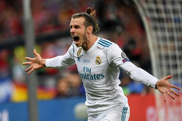 KIEV, UKRAINE - MAY 26: Gareth Bale of Real Madrid celebrates scoring his side's second goal during the UEFA Champions League final between Real Madrid and Liverpool at NSC Olimpiyskiy Stadium on May 26, 2018 in Kiev, Ukraine. (Photo by Etsuo Hara/Getty Images)
