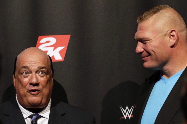 IMAGE DISTRIBUTED FOR 2K - WWE Cover Superstar Brock Lesnar with his advocate Paul Heyman, left, at the WWE 2K17 SummerSlam Kickoff Event in New York, on Friday, Aug. 19, 2016. (Adam Hunger/AP Images for 2K)
