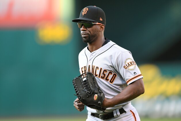 OAKLAND, CA - JULY 21:  Andrew McCutchen #22 of the San Francisco Giants runs off the field at the end of the fouth inning against the Oakland Athletics at the Oakland Alameda Coliseum on July 21, 2018 in Oakland, California.  (Photo by Thearon W. Henderson/Getty Images)
