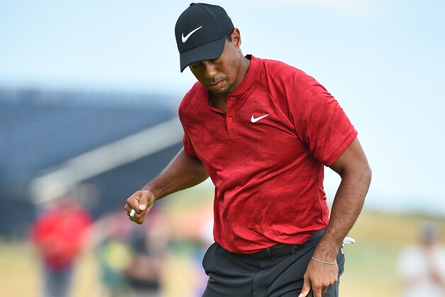 US golfer Tiger Woods reacts after holing his birdie putt on the 14th green during his final round on day 4 of The 147th Open golf Championship at Carnoustie, Scotland on July 22, 2018. (Photo by ANDY BUCHANAN / AFP)        (Photo credit should read ANDY BUCHANAN/AFP/Getty Images)